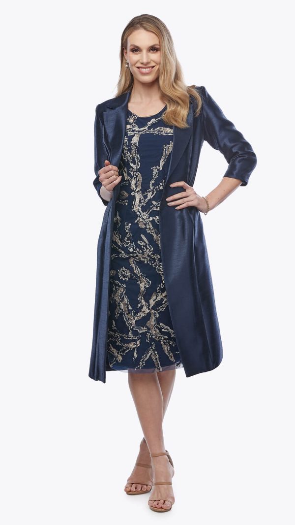 The Embroidered Dress with Shantung Jacket is a timeless look that is both luxurious and refined. This outfit is definitely meant for special moments.