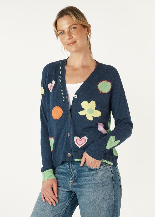 The Happy Cardi is such a cozy and versatile piece! This lightweight knit is ideal for layering during cooler weather. Pair with denim and sneakers.