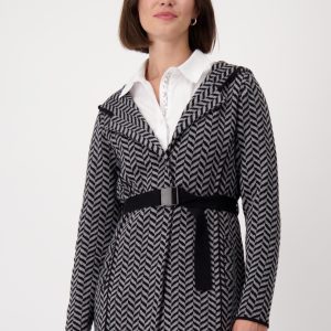 An Italian-designed herringbone belted longline coatigan is a stylish and sophisticated outerwear piece combining the elegance of a coat with the comfort of a cardigan.