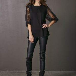 The Vigga Tee is the perfect blend of elegance and versatility. The delicate mesh sleeves give it a chic edge, making it easy to dress up or down.