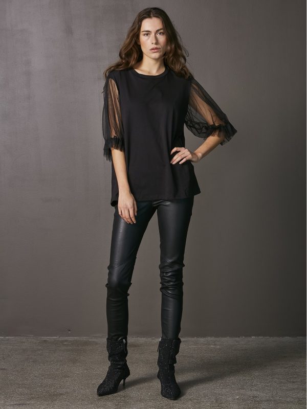 The Vigga Tee is the perfect blend of elegance and versatility. The delicate mesh sleeves give it a chic edge, making it easy to dress up or down.