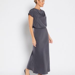 Philosophy maxi bias skirt is a longer length skirt with a fluted hem, wear with sneakers, slides, boots or heels depending on the vibe you're going for.