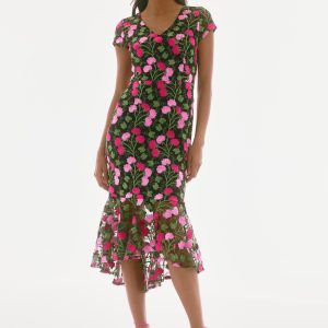 This beautiful dress is a combination of floral embroidery, flouncy hem, and a flattering silhouette, which makes a perfect blend of romantic and playful.