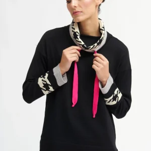 This Dalida Knit Jumper offers a modern, sporty twist with its unique print details. This jumper could be styled for a casual day out or dressed up.