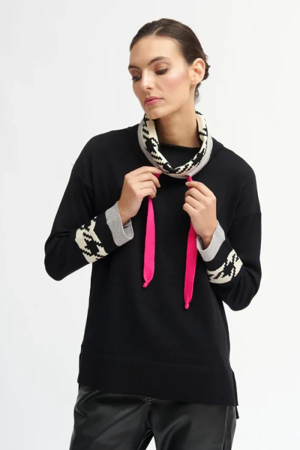 This Dalida Knit Jumper offers a modern, sporty twist with its unique print details. This jumper could be styled for a casual day out or dressed up.
