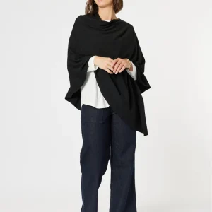 Wrap yourself in elegance with the Macy Knit Poncho. Features a draped neckline and asymmetric hem, this versatile piece adds a stylish layer to any outfit.