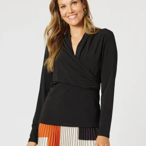 The Opera Top features a flattering wrap-style neckline, this elegant piece shapes your figure while providing a sleek, tailored fit.