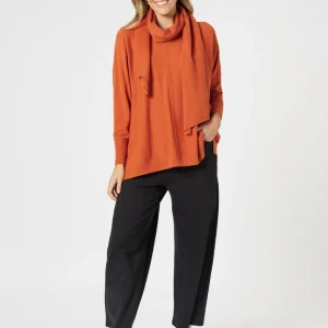 Stay stylish and warm with the versatile Remy Scarf Knit.This 2 in 1 acts as both a scarf and a knitted top, perfect for keeping you cosy in colder weather.