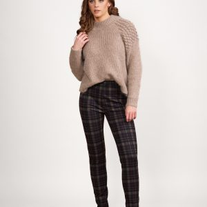 The Vassalli Skinny Leg Printed Pull-On Ponti Pant is a mid-weight stretchy pant featuring a black, red, and beige plaid design.