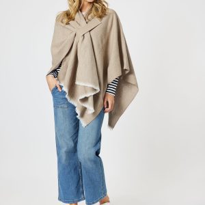 This piece boasts an edge-to-edge front design, complete with a self-tab to keep the wrap securely in place, ensuring both comfort and warmth.