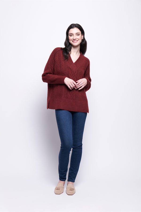 A plush cable knit with a sustainable blend of recycled materials that offers warmth without bulk. An easy to wear relaxed fit with a cozy feel.