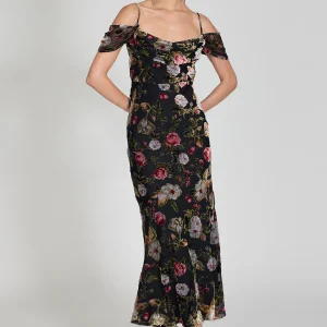 Graceful and elevated, the Machessa Draped Sleeve Dress features a soft bias-cut silhouette and an off-shoulder neckline.