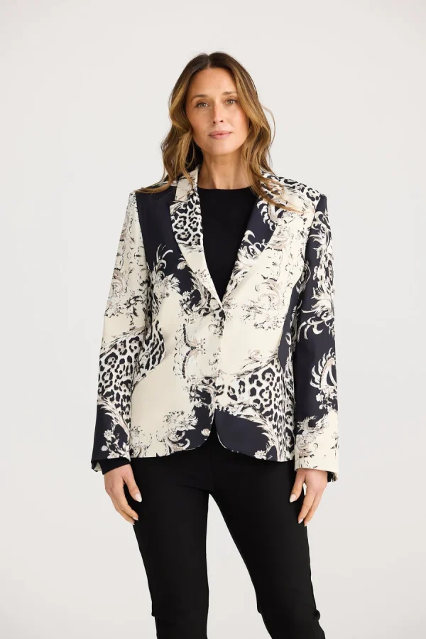 The Ritz Blazer is a bold twist on a classic. Made from a luxe printed polyester satin fabric, it features eye-catching baroque-inspired details.
